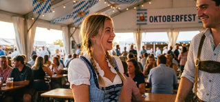 Texas Oktoberfest event with guests in traditional dirndl and lederhosen, Bavarian beer hall atmosphere, and lively festival celebrations.