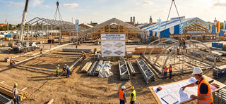 Construction crews building Oktoberfest 2026 beer tents following the official six-phase development plan.