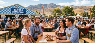 Friends enjoying Oktoberfest in Nevada with Bavarian food, beer, and mountain festival views.