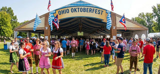 Ohio Oktoberfest festival featuring a large beer tent, Bavarian costumes, and lively crowds.